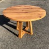 Round table with tapered pedestal